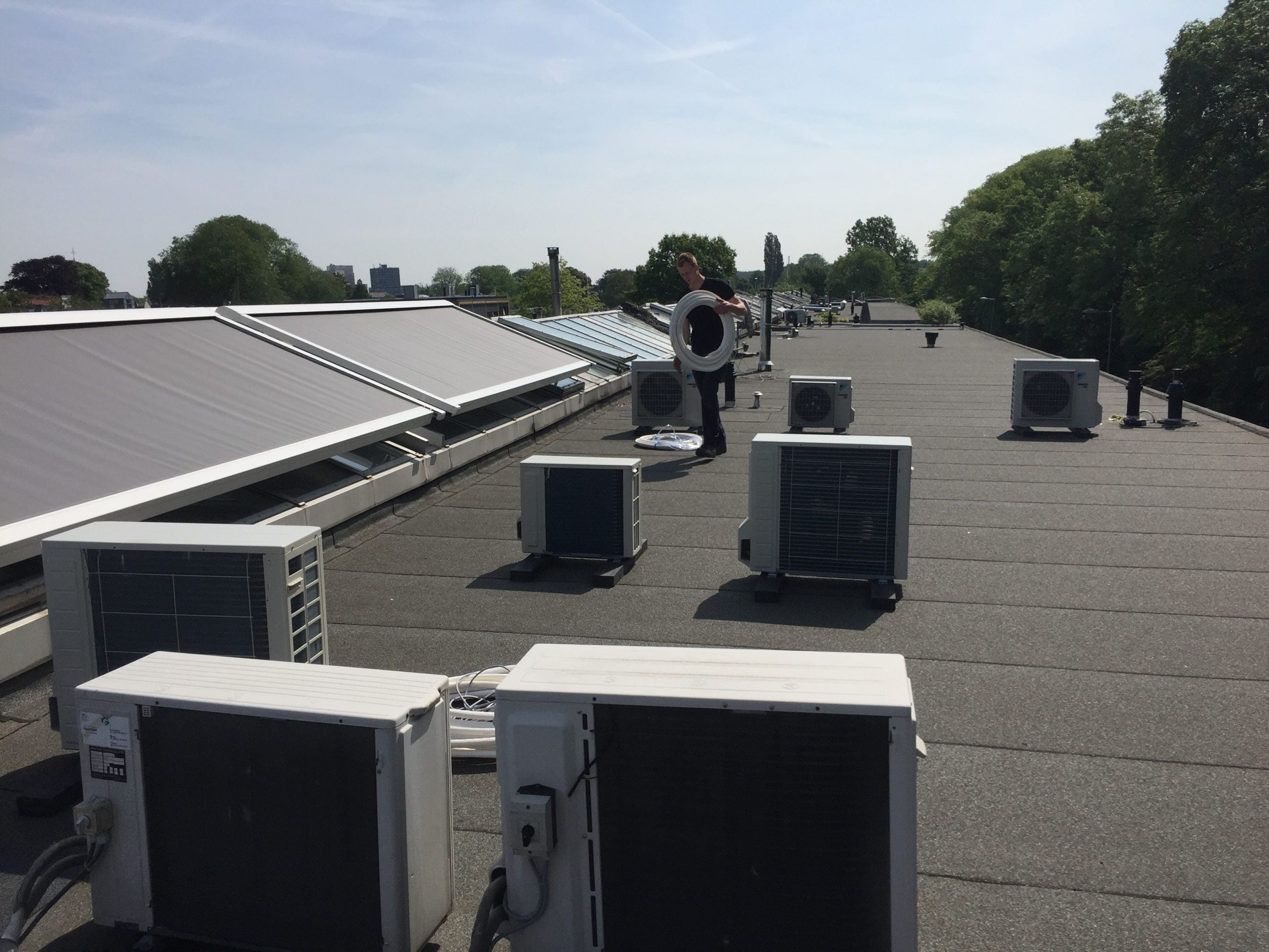 Spruijt Klimaat - Hoogwerker Amsterdam airco VRV systeem Spruijt Klimaat dak